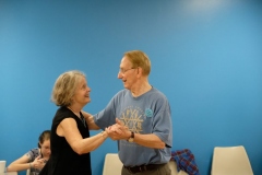 John Gracefully Leads his Partner